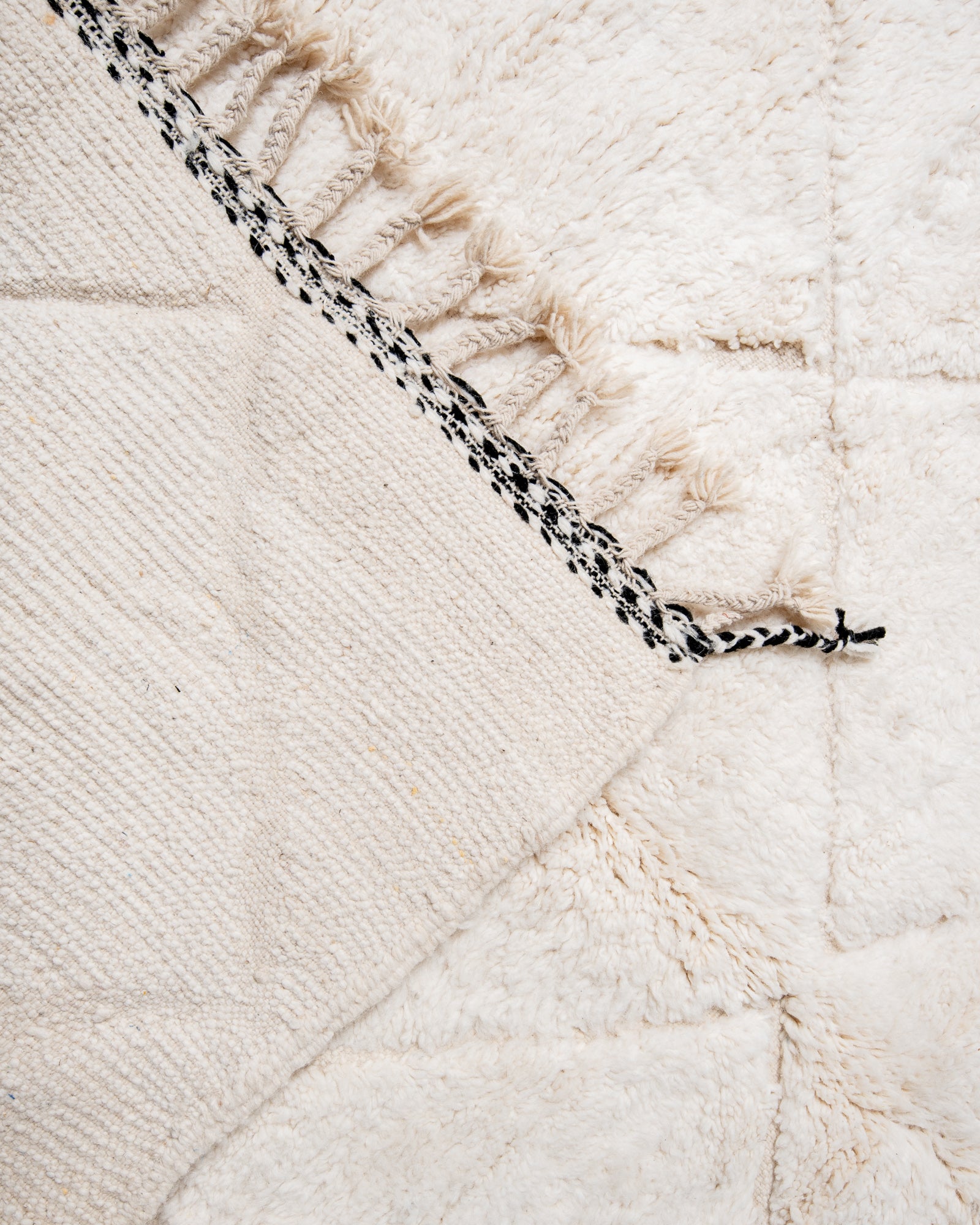 Modern, designer, handcrafted Berber rug from Morocco. Beniourain carpet with beautiful colours and patterns and fluffy wool texture.